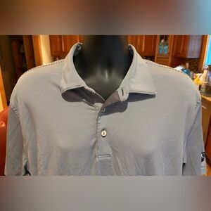 Peter Millar men’s golf polo. Sharp black/white micro stripe w/logo on sleeve. L